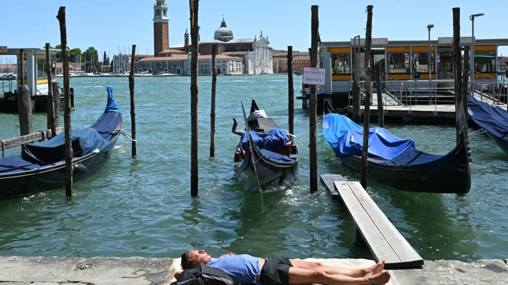 Europe swelters in summer’s first heatwave as climate change intensifies