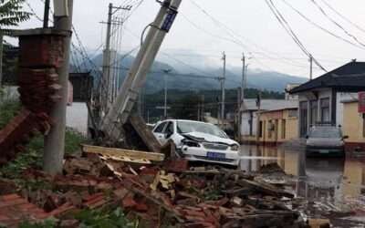 China floods leave 30 dead, tens of thousands forced to flee