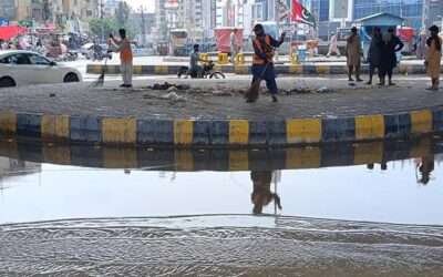 Holiday offers little relief as Karachi’s working class braves flooded streets