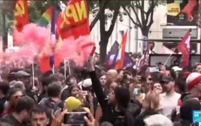 Police clash with thousands protesting Macron across France