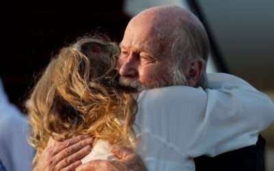 Emotional moment British couple held for months by Taliban are reunited with daughter